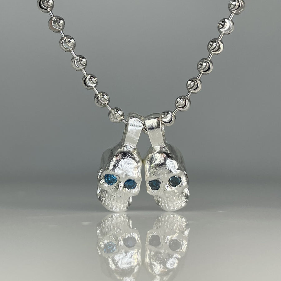 Medium Blue Diamond Evil Twins Skull Necklace 0.16ct