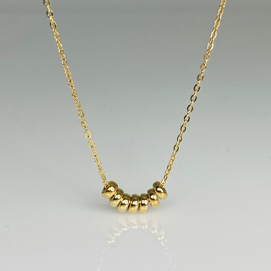 7 Wishes Gold Barrel Necklace