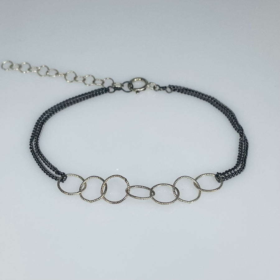 Silver Dual Toned Lucky Seven Bracelet