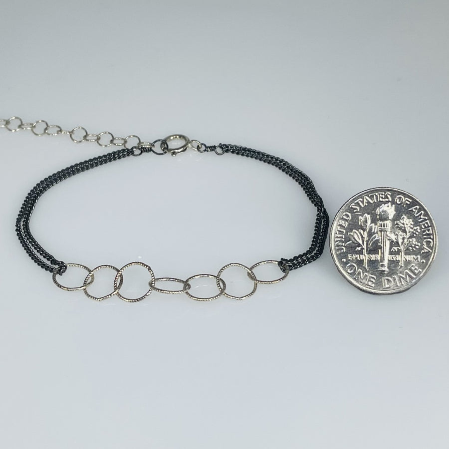 Silver Dual Toned Lucky Seven Bracelet